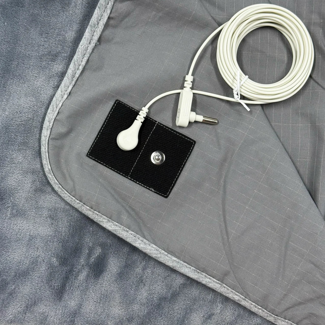 Manta Con conexión Tierra